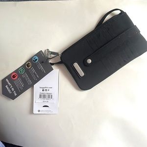 Black baggallini never used, tags still on!!